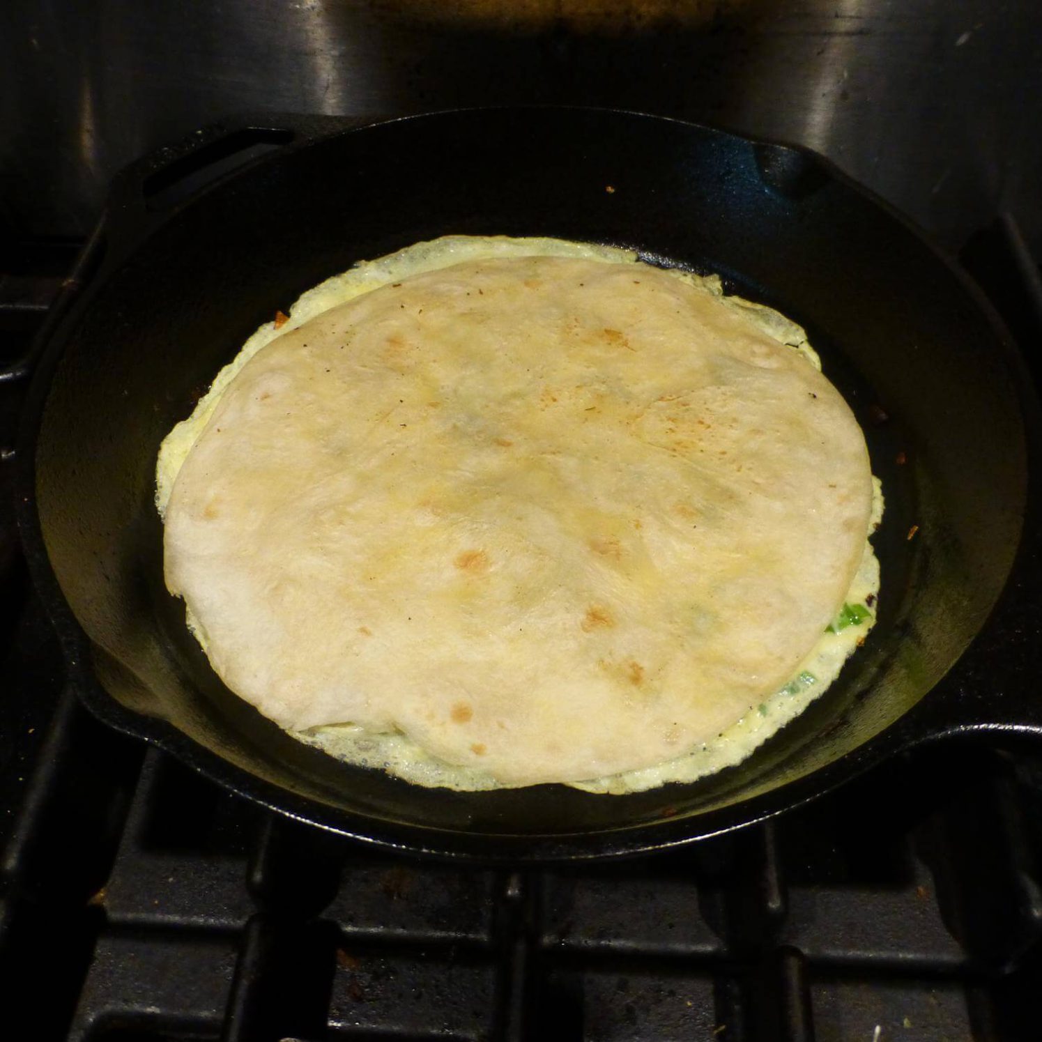 Tortilla and Egg Before Flipping