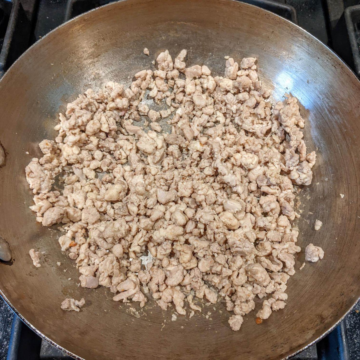 Cooking the chicken for laab gai