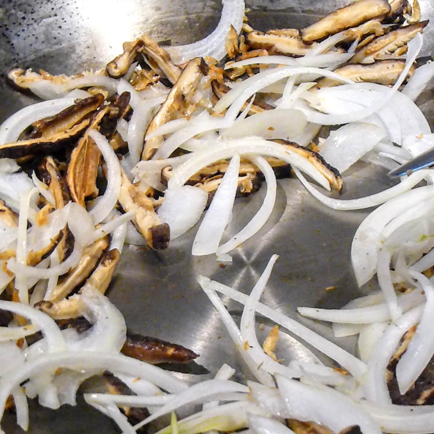 Stir Frying the Shittake Mushroom, Dried Shrimp, and Onion