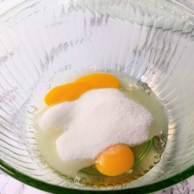 Eggs, sugar, and salt in a bowl